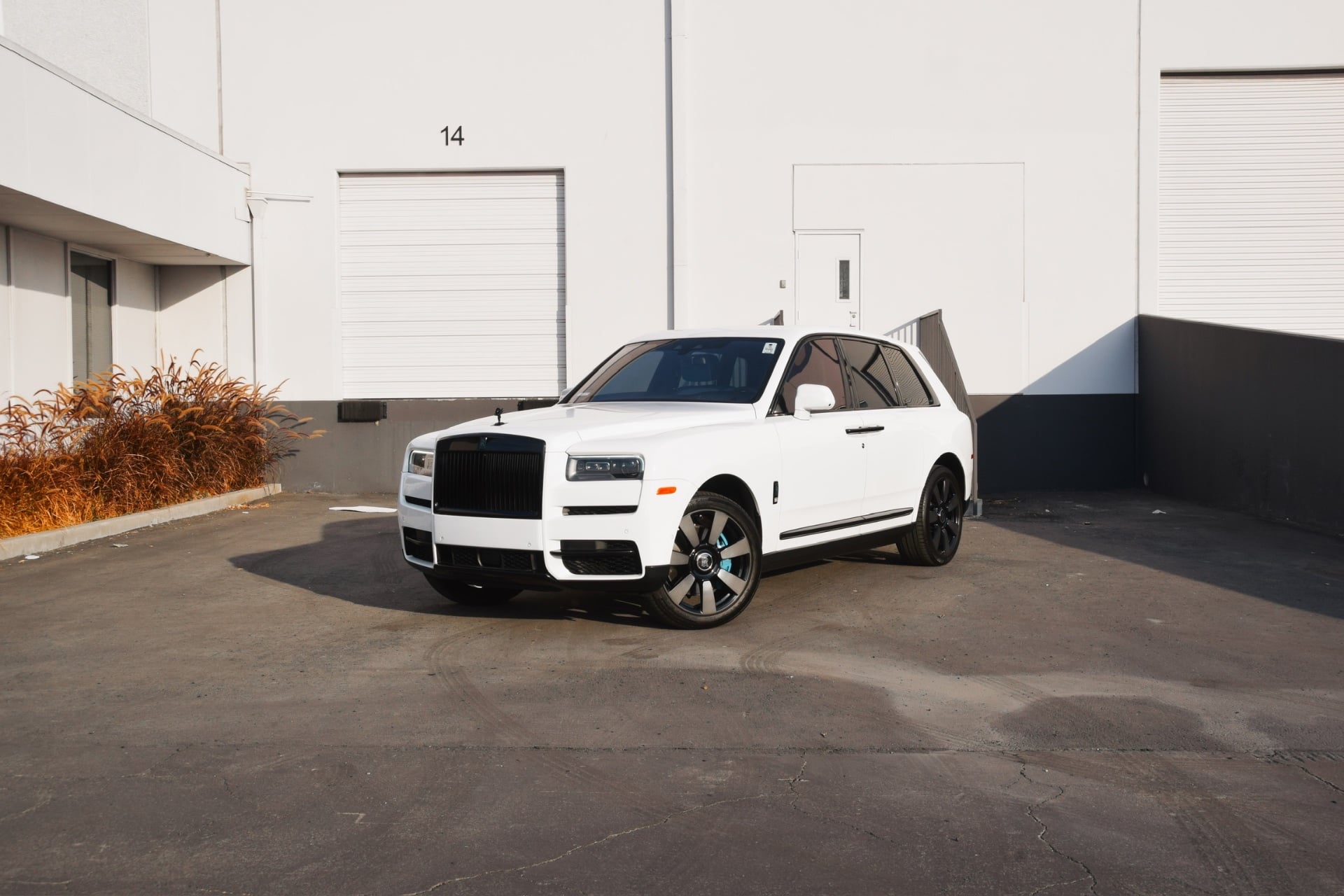 Rolls-Royce Cullinan in White with Tiffany Blue accents available for rental in Los Angeles