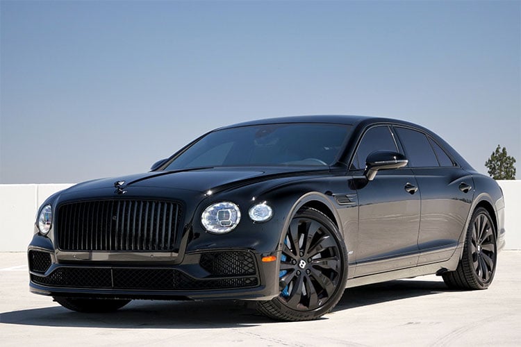 Black Bentley Flying Spur with blue interior available for rental in Los Angeles